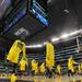 Michigan junior Tim Hardaway Jr. and his teammates stretch on the court during warm ups before the start of their Elite Eight game against Florida at Cowboys Stadium on Sunday, March 31, 2013. Melanie Maxwell I AnnArbor.com